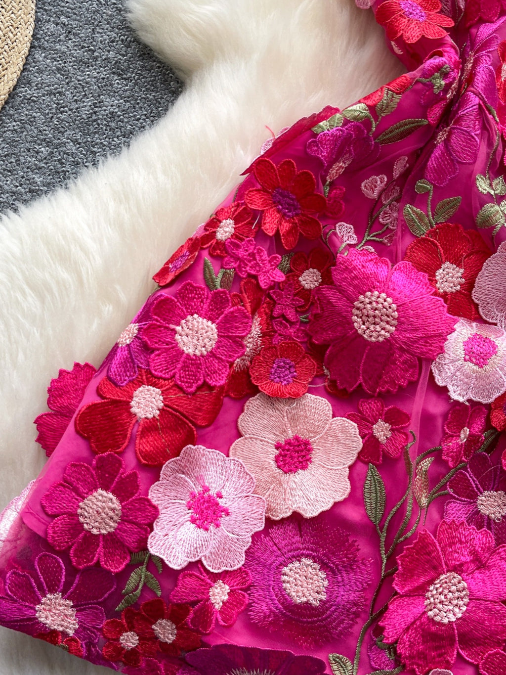 Floral embroidered tie waist mini dress by Trendsi featuring an elegant summer A-line silhouette and floral embroidery detail.