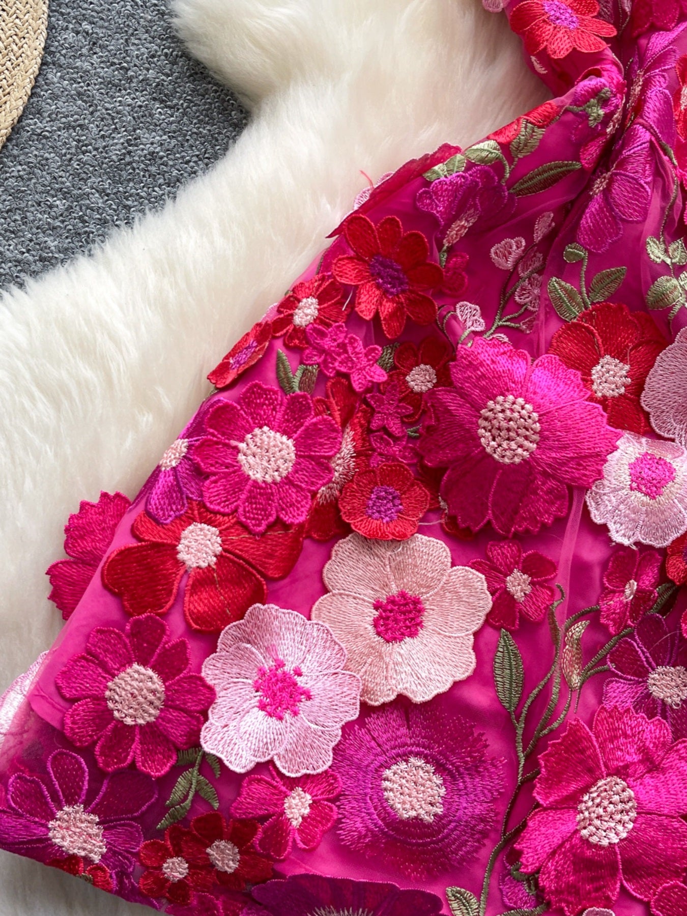 Floral embroidered tie waist mini dress by Trendsi featuring an elegant summer A-line silhouette and floral embroidery detail.