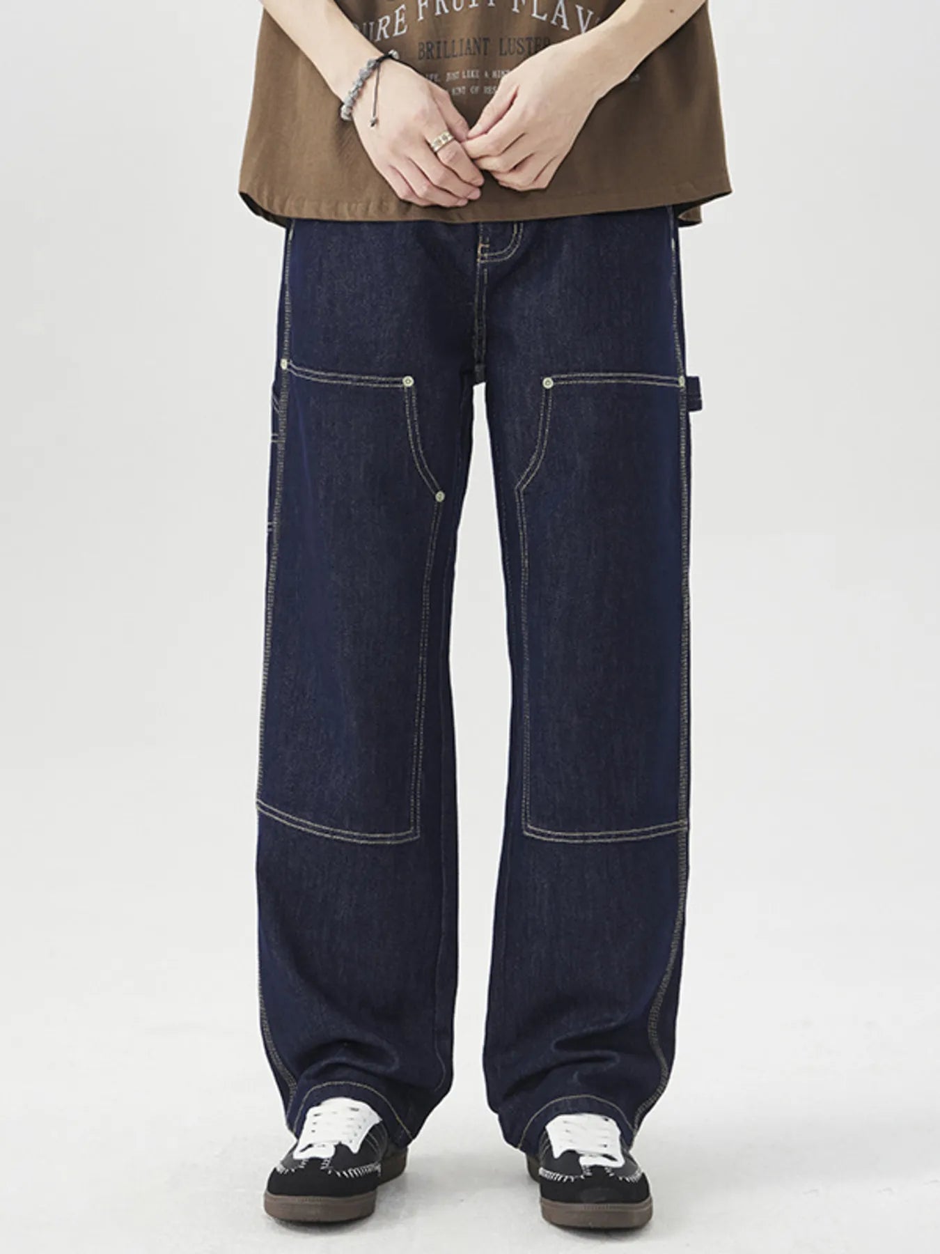 Men's wide leg cargo jeans from Trendsi featuring relaxed fit, multiple pockets, and denim fabric, perfect for casual wear.