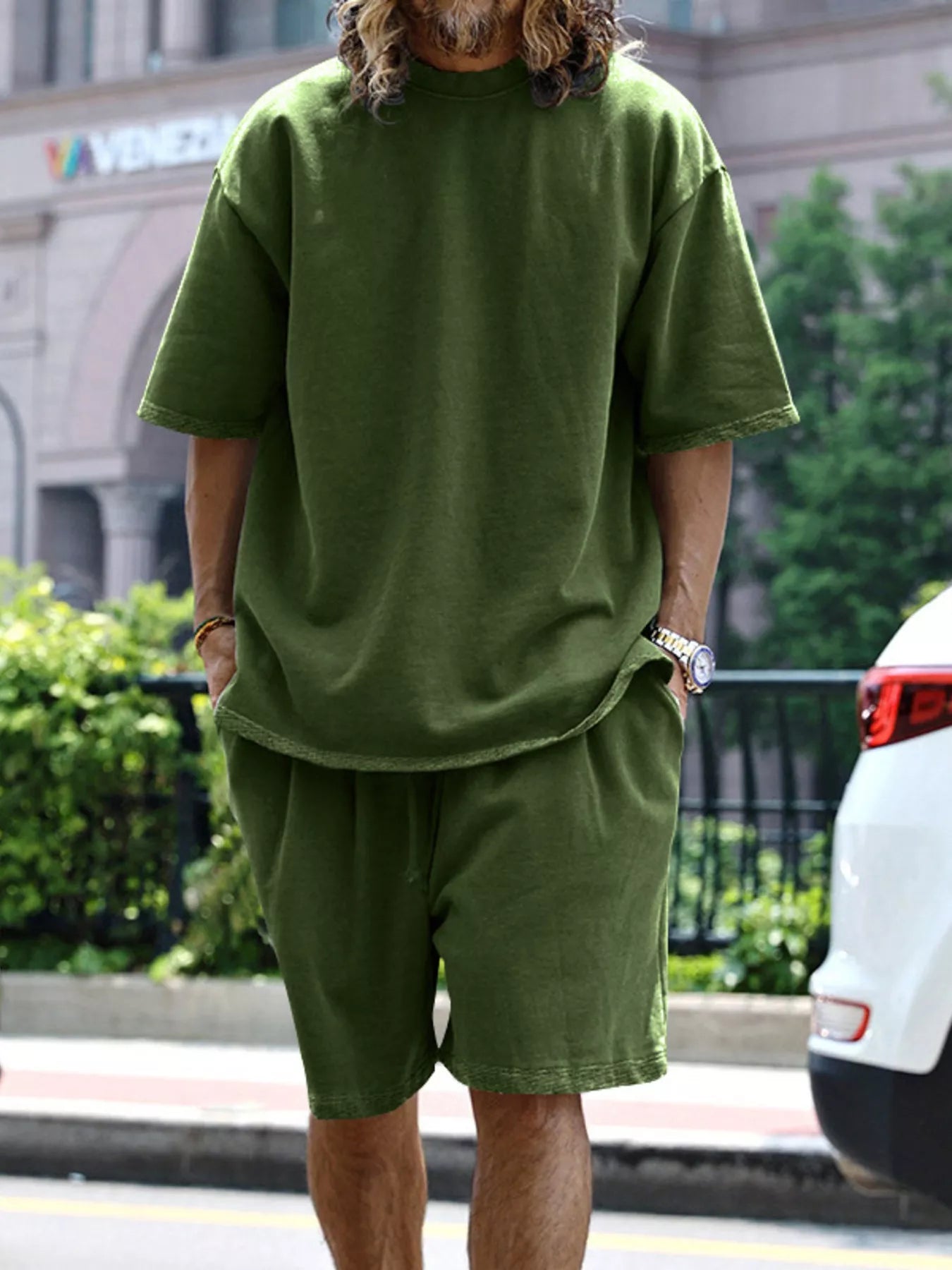Men's full size relaxed fit T-shirt and shorts set by Trendsi, plus size casual loungewear in soft fabric with comfortable fit.