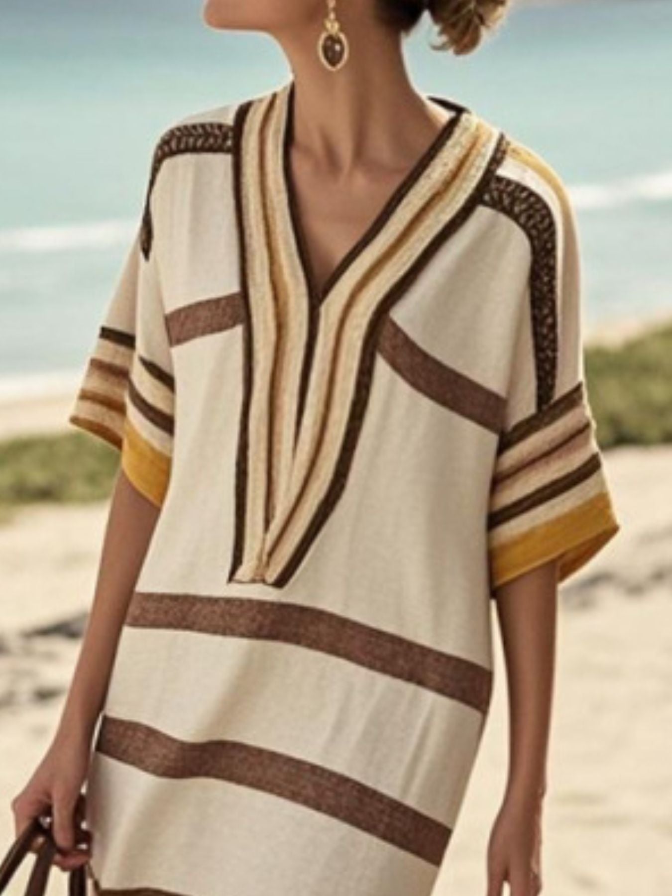 Plus size women's striped midi dress with half sleeves, casual chic style, featuring a relaxed fit and trendy design.