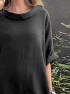Full-length image of Plush Fashion Hub casual loose fit round neck midi dress with pockets, showcasing its relaxed style and comfortable fit.