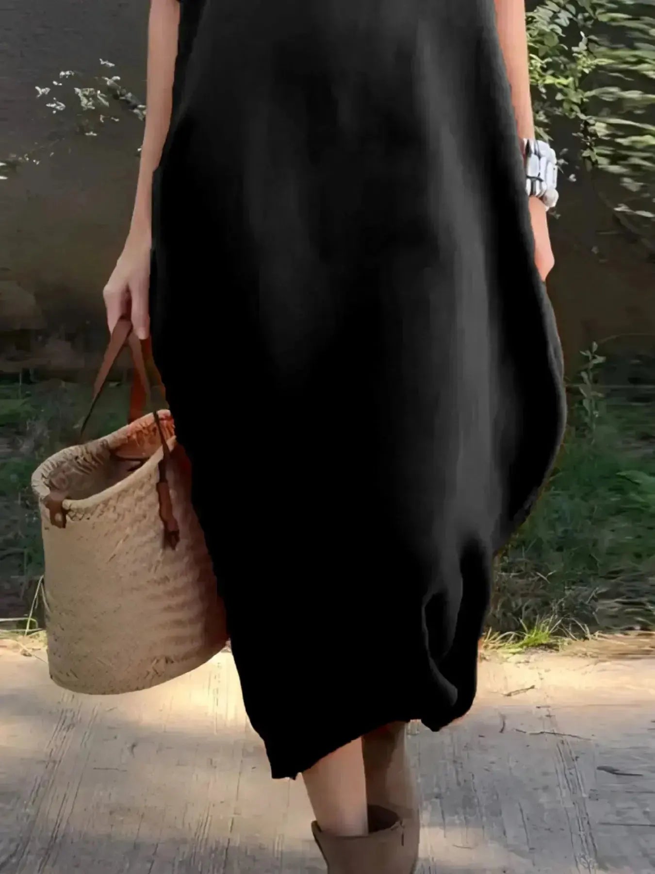 Casual loose fit round neck midi dress with pockets by Plush Fashion Hub, shown in a plus-size, full-length view.