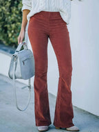 Plus size women's high-waisted corduroy flare pants with boho style from Plush Fashion Hub, full-length view.