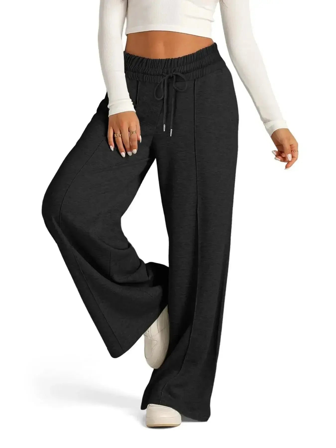 Full-length image of plush beige women's relaxed fit wide-leg drawstring lounge pants by Plush Fashion Hub.