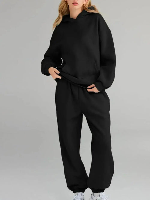 Plus size women's hoodie and jogger sweat set with kangaroo pocket from Plush Fashion Hub, comfortable and casual loungewear.