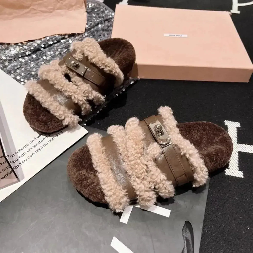 Fuzzy faux fur buckle slippers from Plush Fashion Hub with plush interior and stylish buckle accent for cozy comfort.