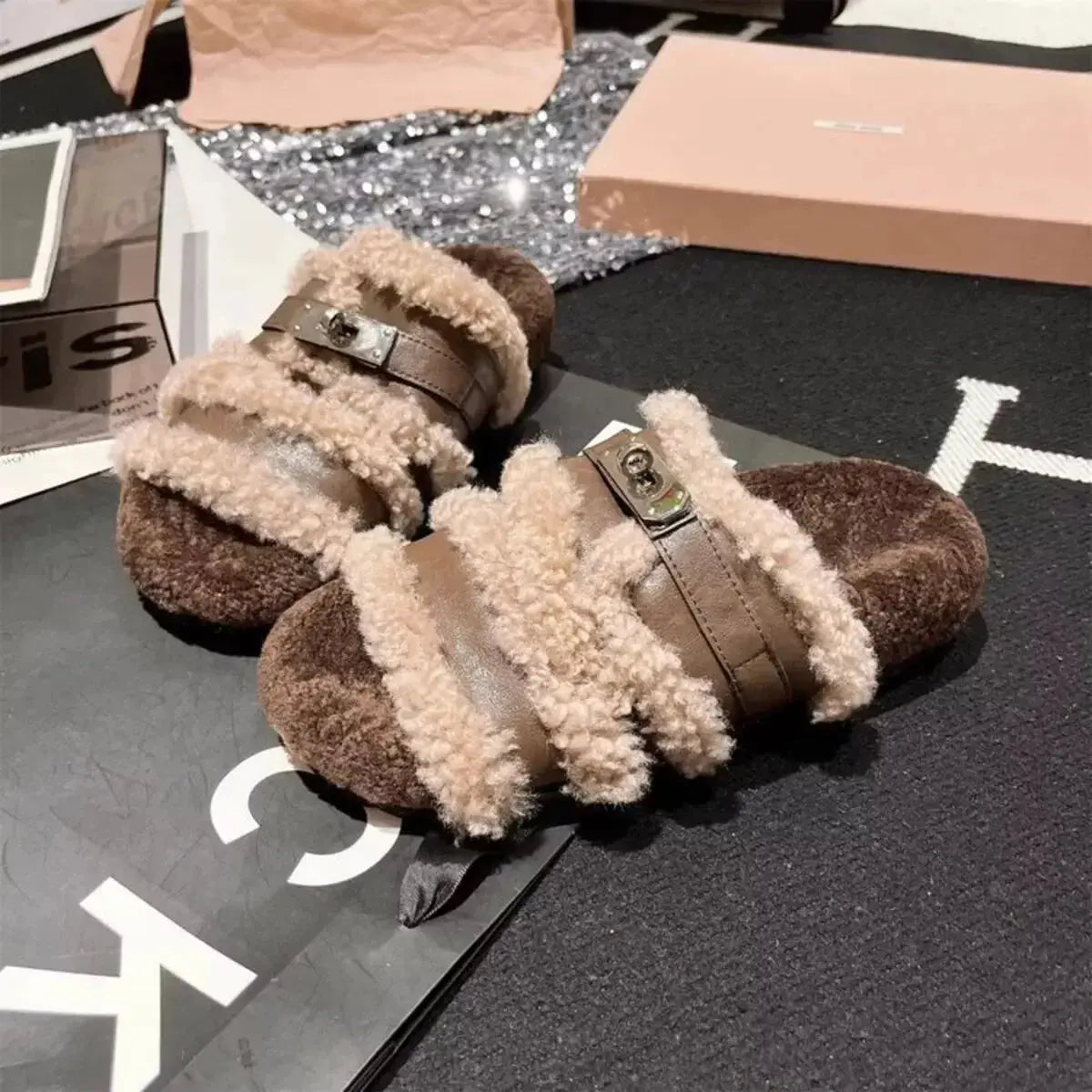 Fuzzy faux fur buckle slippers by Plush Fashion Hub with plush texture and cozy design, perfect for indoor comfort.