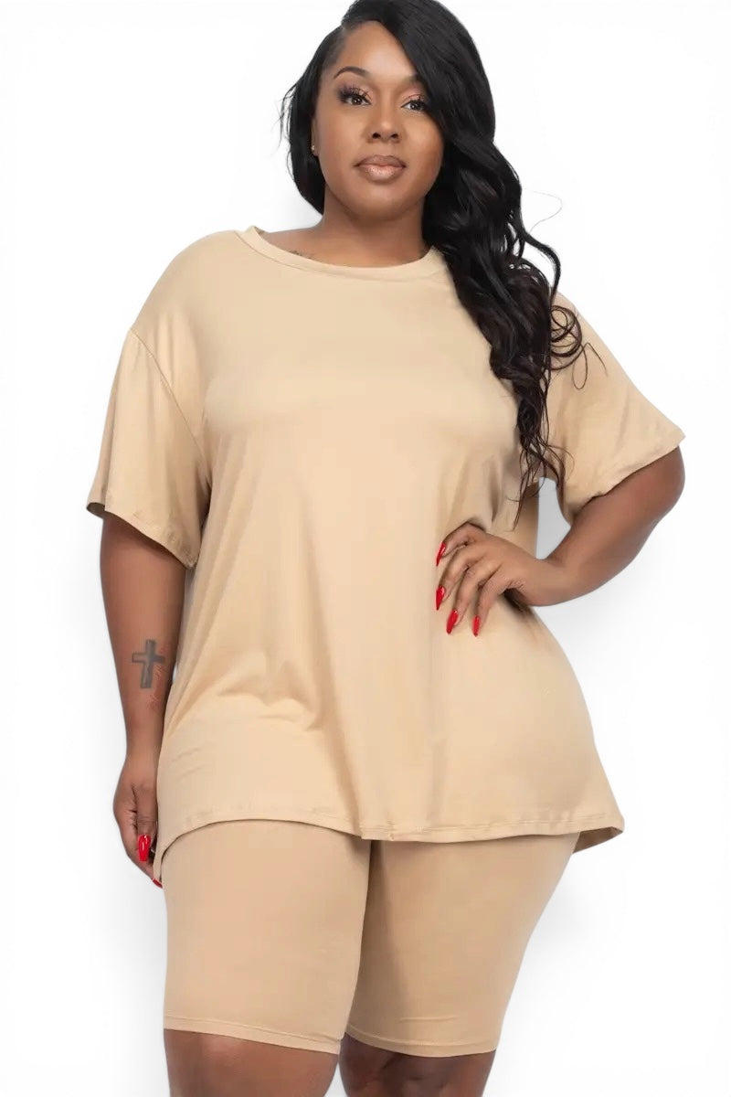 Model wearing a beige, oversized loose-fit t-shirt and matching bike shorts set.