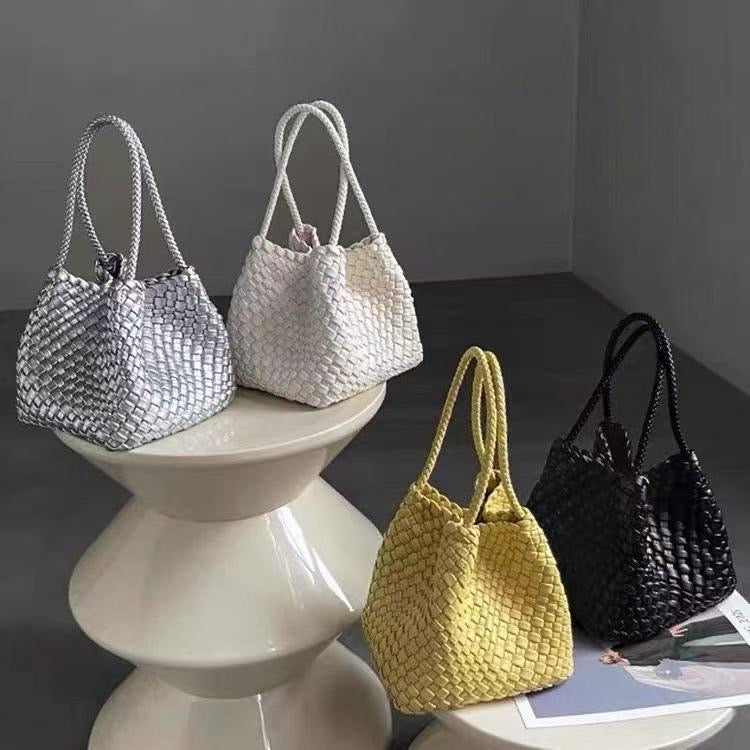 Hand-pressed woven tote bag by Plush Fashion Hub featuring natural fibers and sturdy handles for everyday carry.