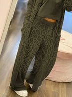 Women's long sleeve longline blazer and trousers 2-piece suit set from Plush Fashion Hub, shown on a model.