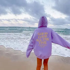 Unisex brushed fabric drawstring hoodie with letter print in urban streetwear style by Plush Fashion Hub, worn by men and women.