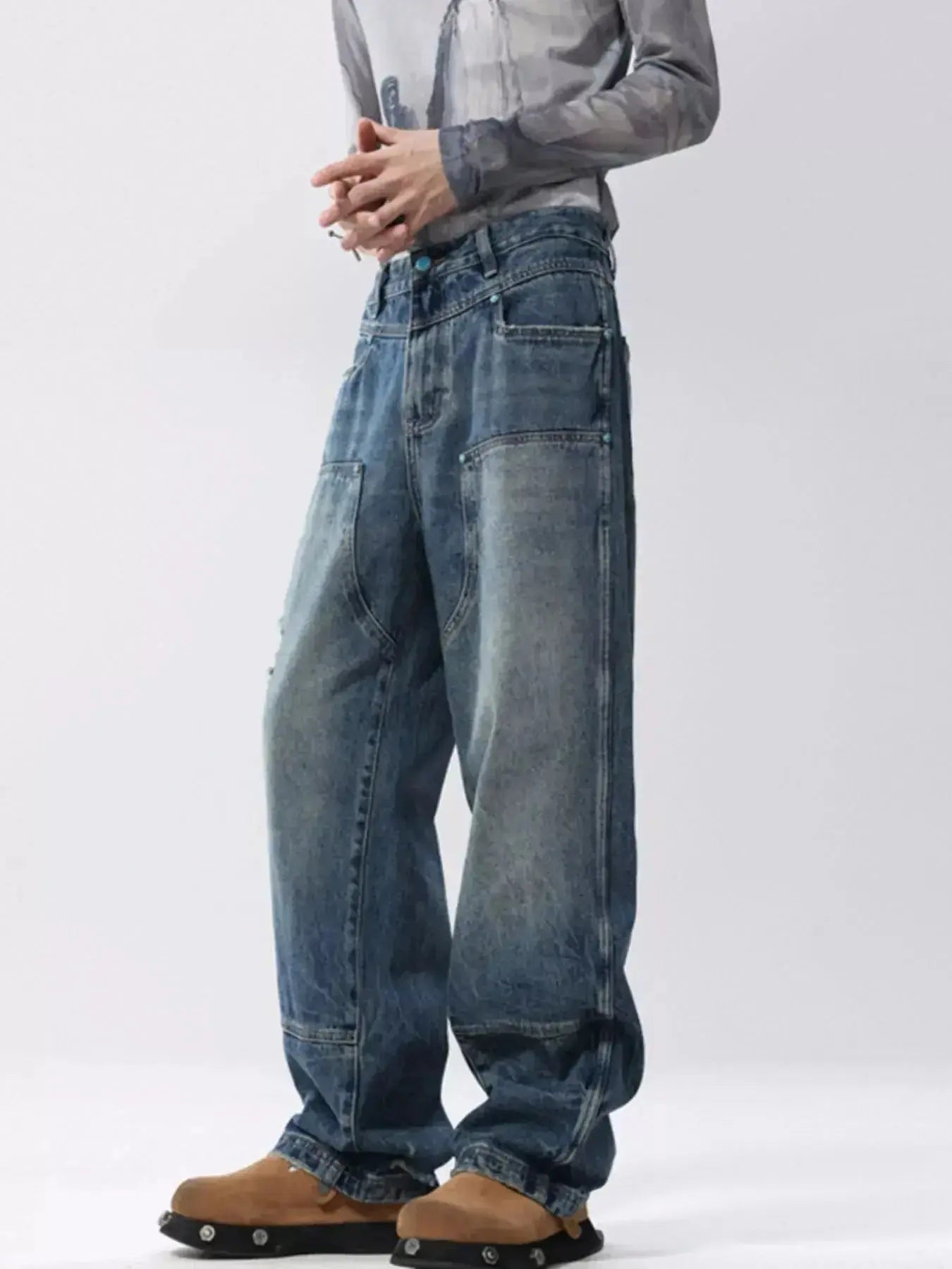 Men's distressed wide leg jeans in relaxed fit cotton denim by Trendsi, shown with a casual style fit.
