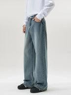 Men's vintage wash wide-leg jeans by Trendsi, relaxed fit retro denim with a classic relaxed silhouette and stylish wash.