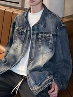Men's vintage washed denim jacket by Trendsi, durable 100% cotton outerwear, classic denim style, shown on a model.