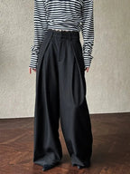 Retro high-waisted denim jeans with studded details and vintage style, featuring a wide-leg fit from Plush Fashion Hub.