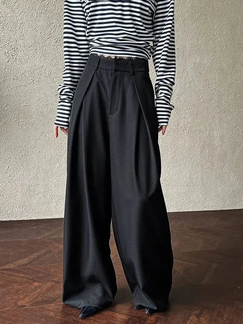 Retro high-waisted denim jeans with studded details and vintage style, featuring a wide-leg fit from Plush Fashion Hub.