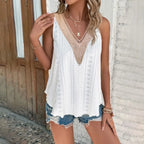 Light beige VibeEase V-Neck Summer Tank Top by FitiqueFit, casualwear, shown on a hanger with a relaxed fit and soft fabric.