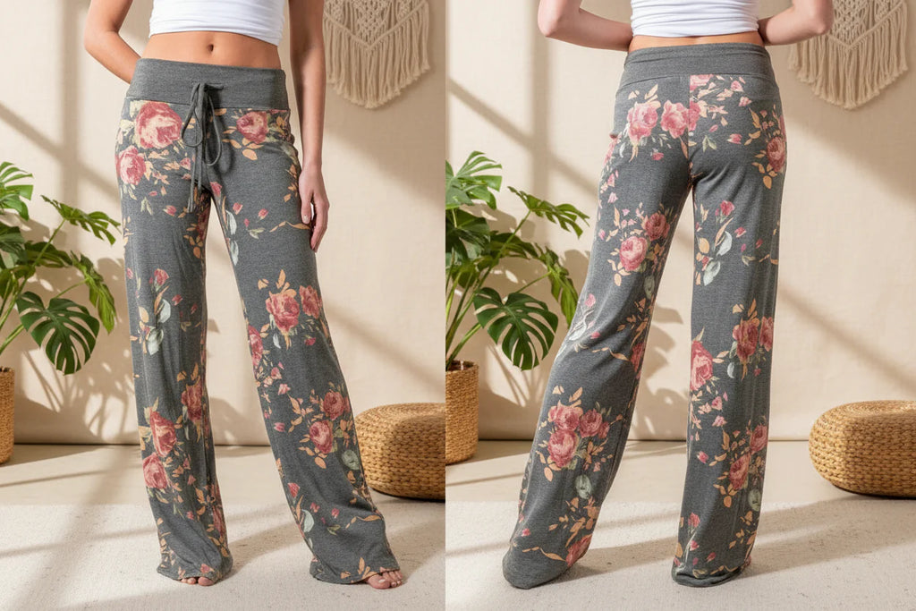 Charcoal grey wide-leg lounge pants with a pink floral print, featuring a drawstring waist and soft, relaxed fit.