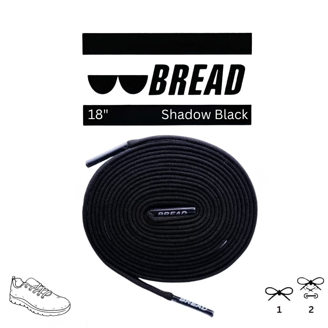 Black elastic shoelaces from Bread's Shadow Black collection, shown in a close-up image highlighting their stretchy, durable design.