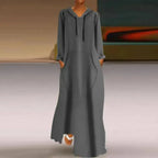 Women's relaxed fit long hooded sweatshirt in a solid color from Plush Fashion Hub, cozy and casual pullover with a loose fit.