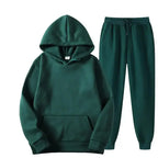 Oversized women's hooded sweatshirt and jogger lounge set from Plush Fashion Hub, made of soft polyester with sparkling fabric details.