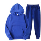 Oversized women's hooded sweatshirt and jogger lounge set by Plush Fashion Hub, made of soft polyester fabric with a sparkling style.