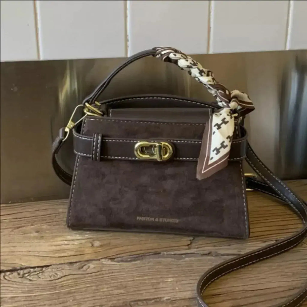 Plush Fashion Hub premium suede mini crossbody bag with adjustable leather strap and sleek design.