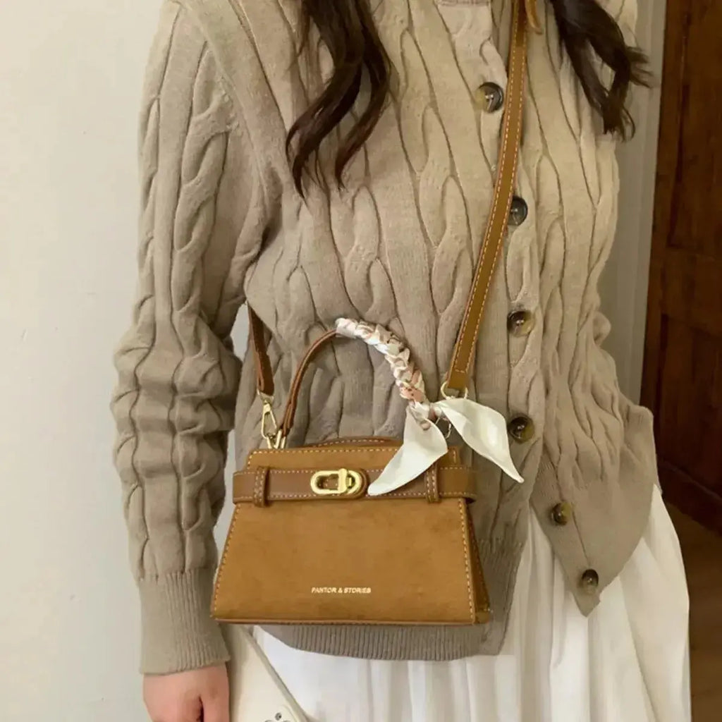 Plush Fashion Hub premium suede mini crossbody bag with adjustable leather strap, compact and stylish accessory for everyday use.
