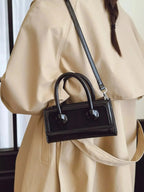 Premium leather top handle crossbody bag by Plush Fashion Hub, featuring a structured, versatile handbag with a sleek design.