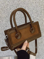 Plush Fashion Hub premium leather top-handle crossbody bag with structured design, versatile for everyday use.