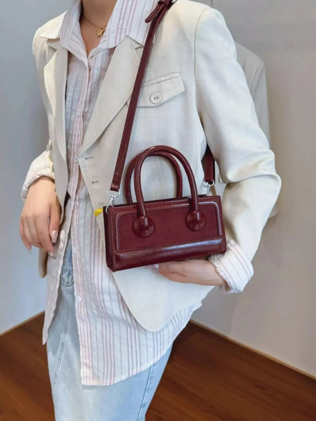 Plush Fashion Hub premium leather top handle crossbody bag with structured design, versatile for daily use and stylish occasions.