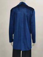 Velvet one-button lightweight coat in a sophisticated minimalist design, featuring a sleek silhouette and soft fabric.