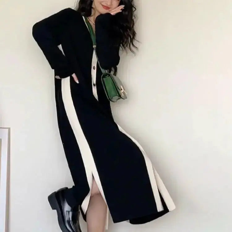 Women’s black long sleeve knitted A-line midi dress by Plush Fashion Hub, soft and versatile for stylish everyday wear.