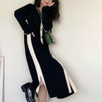 Women’s black long sleeve knitted A-line midi dress by Plush Fashion Hub, soft and versatile for stylish everyday wear.