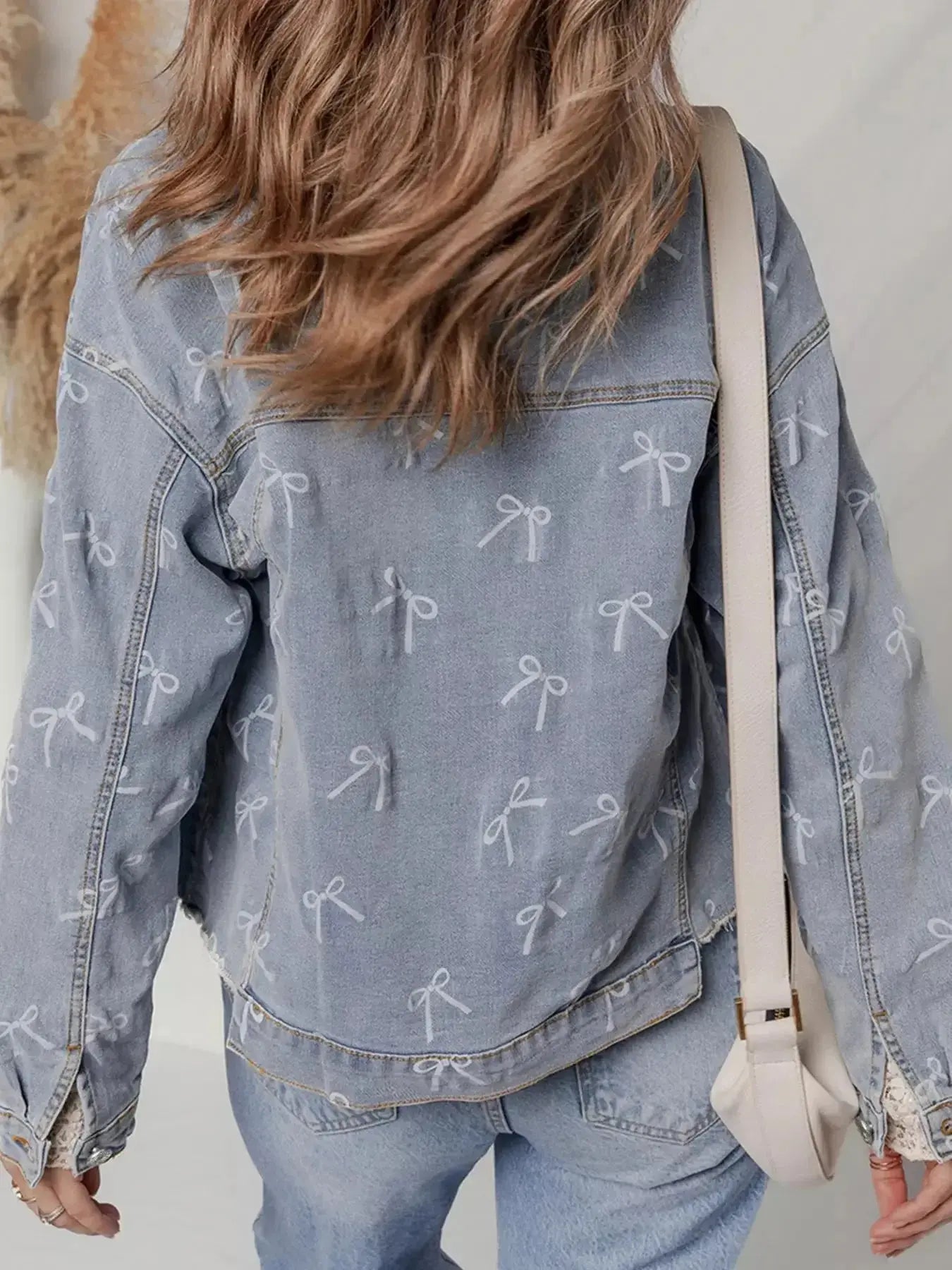 Bow Knot Print Light Wash Raw Hem Denim Jacket - Plush Fashion Hub