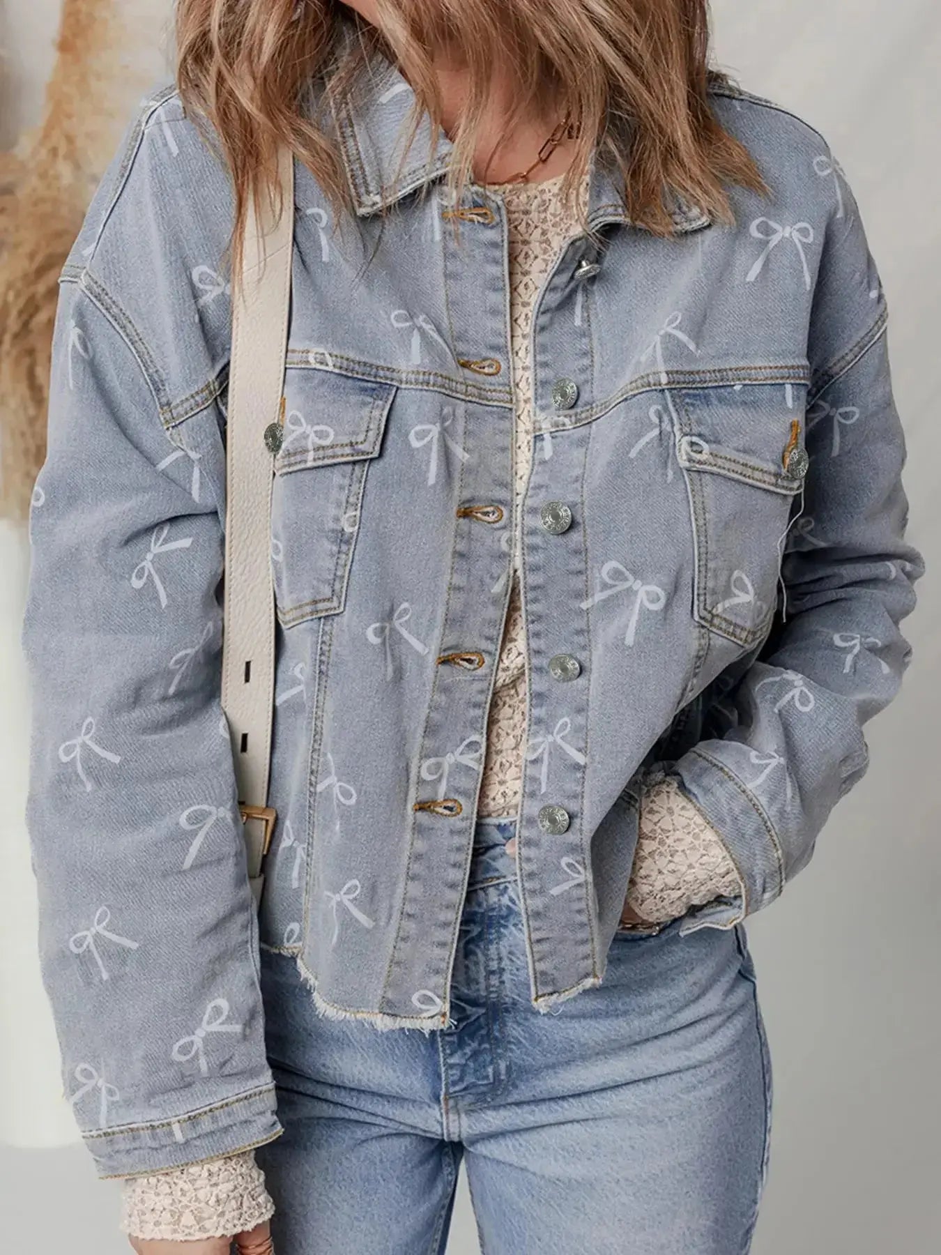 Bow Knot Print Light Wash Raw Hem Denim Jacket - Plush Fashion Hub