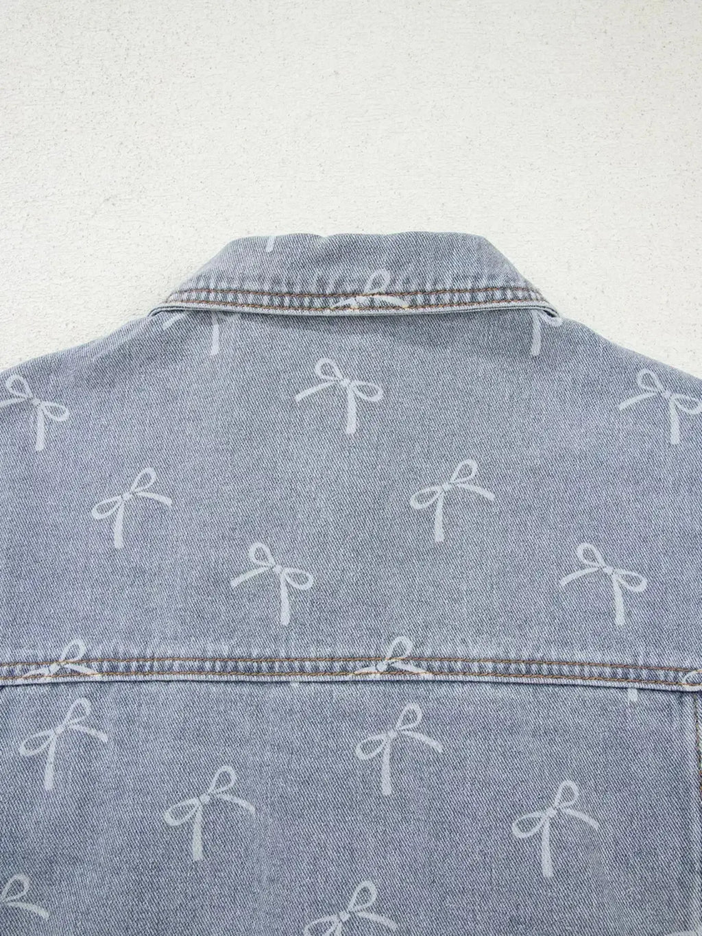 Bow Knot Print Light Wash Raw Hem Denim Jacket - Plush Fashion Hub