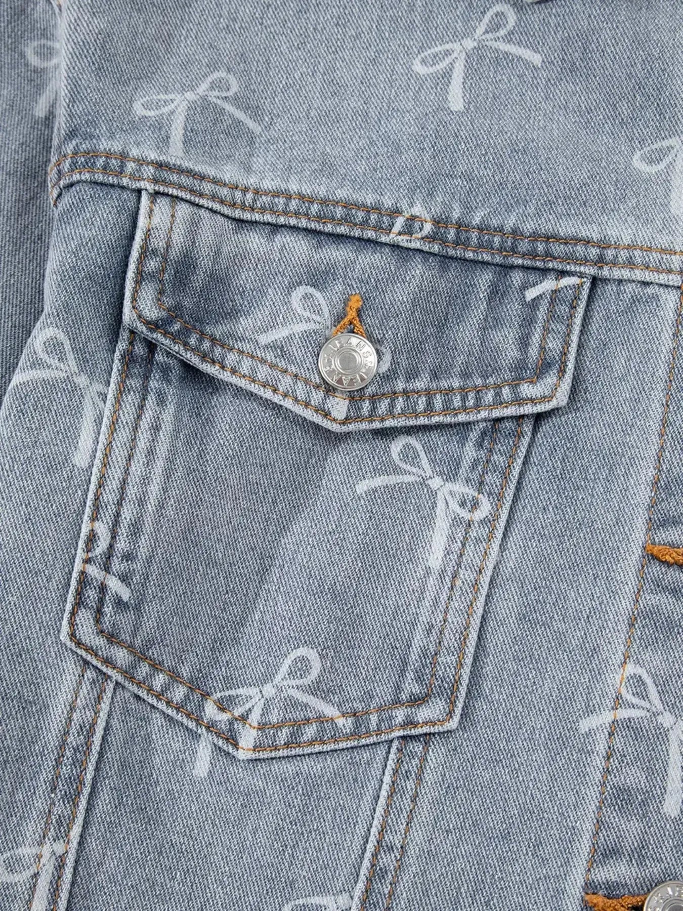 Bow Knot Print Light Wash Raw Hem Denim Jacket - Plush Fashion Hub