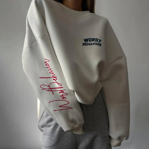 Women wearing a soft round neck casual sweater by Plush Fashion Hub, featuring a cozy fit and smooth fabric in a relaxed style.