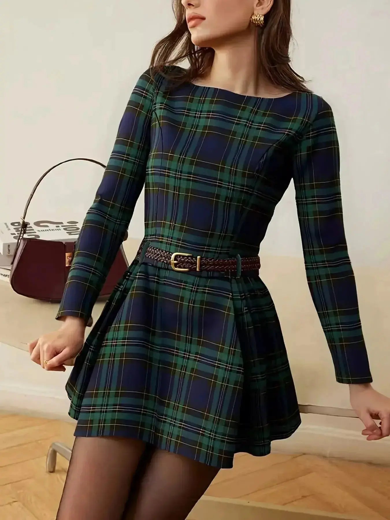 Women’s long sleeve plaid A-line casual dress by Trendsi, lightweight fall fashion with a relaxed fit and stylish plaid pattern.