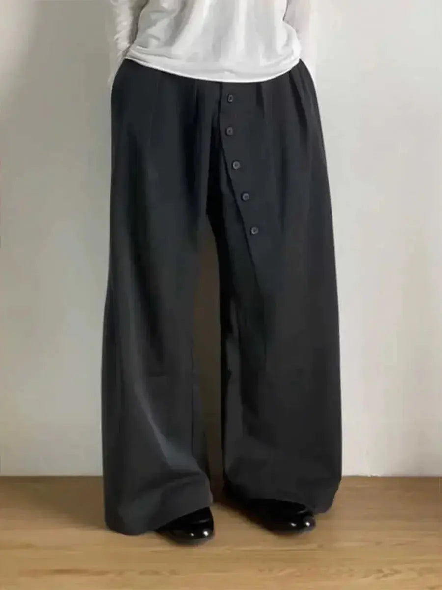 Women’s loose-fit high-waisted trousers with button details from Plush Fashion Hub, stylish and comfortable suit trousers for women.