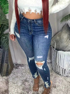 Plus Size Slim Fit Distressed Jeans - Plush Fashion Hub