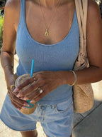 Scoop neck knit tank top by Trendsi, featuring a soft, fitted design with ribbed texture in a neutral color.