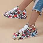 Women's FitiqueFit round-toe thick-sole lace-up sneakers with casual print, showcasing stylish footwear design.
