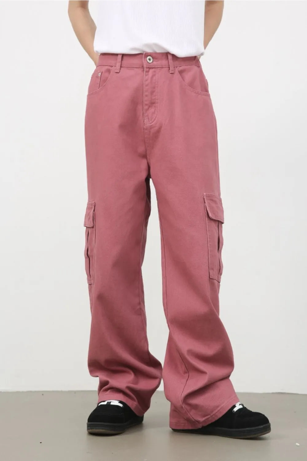 Men's mid-rise jeans with cargo pockets from Trendsi, featuring classic denim fabric and functional side and back pockets.