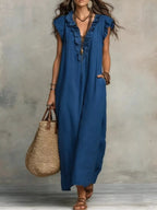 Plus size ruffled V-neck cap sleeve maxi dress by Trendsi, flowing fabric and elegant design for a stylish, full-length dress.
