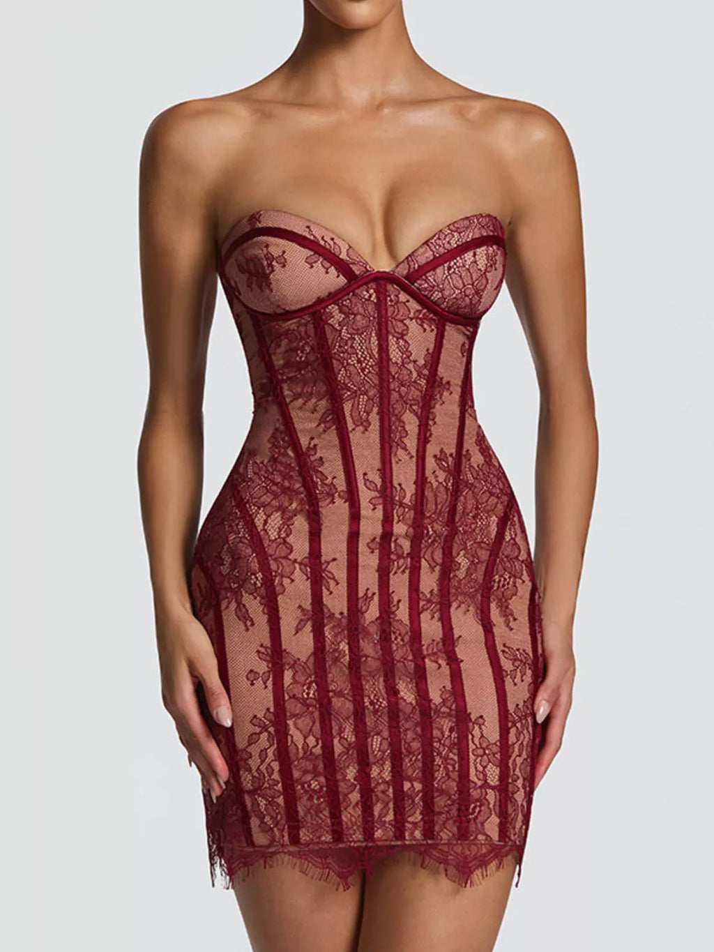 Lace detail tube mini dress by Trendsi featuring a fitted silhouette and intricate lace accents, perfect for stylish occasions.