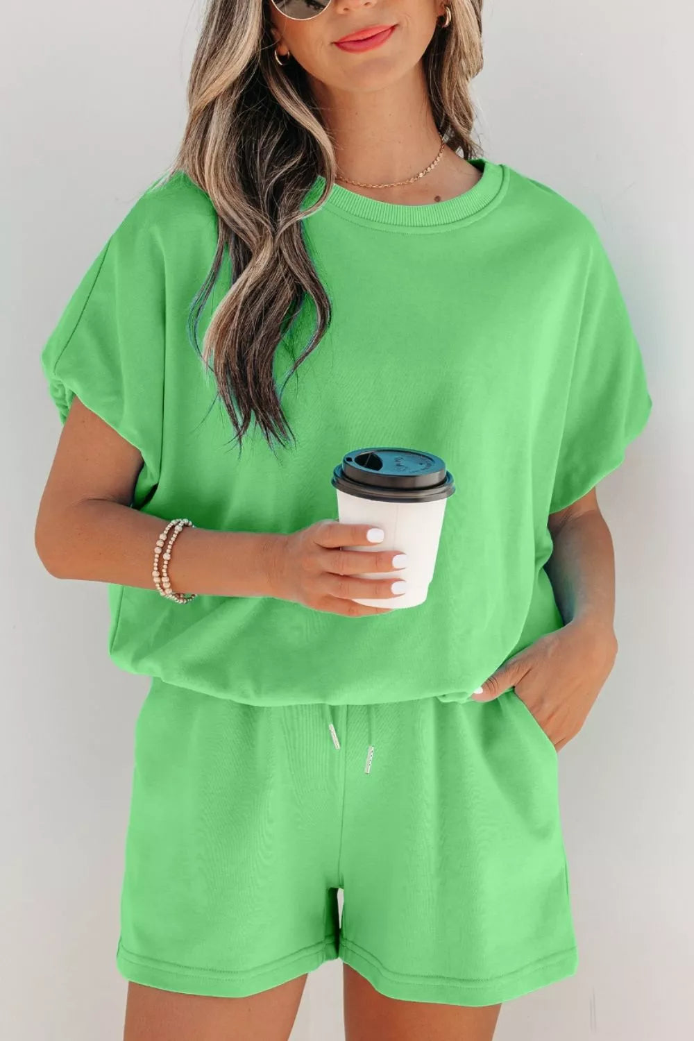 Solid color puffy loose fit drawstring shorts set by Trendsi, includes two-piece outfit with comfortable, casual style.