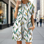Floral print loose pocket dress by FitiqueFit with round neck and short sleeves, casual wear perfect for warm weather.